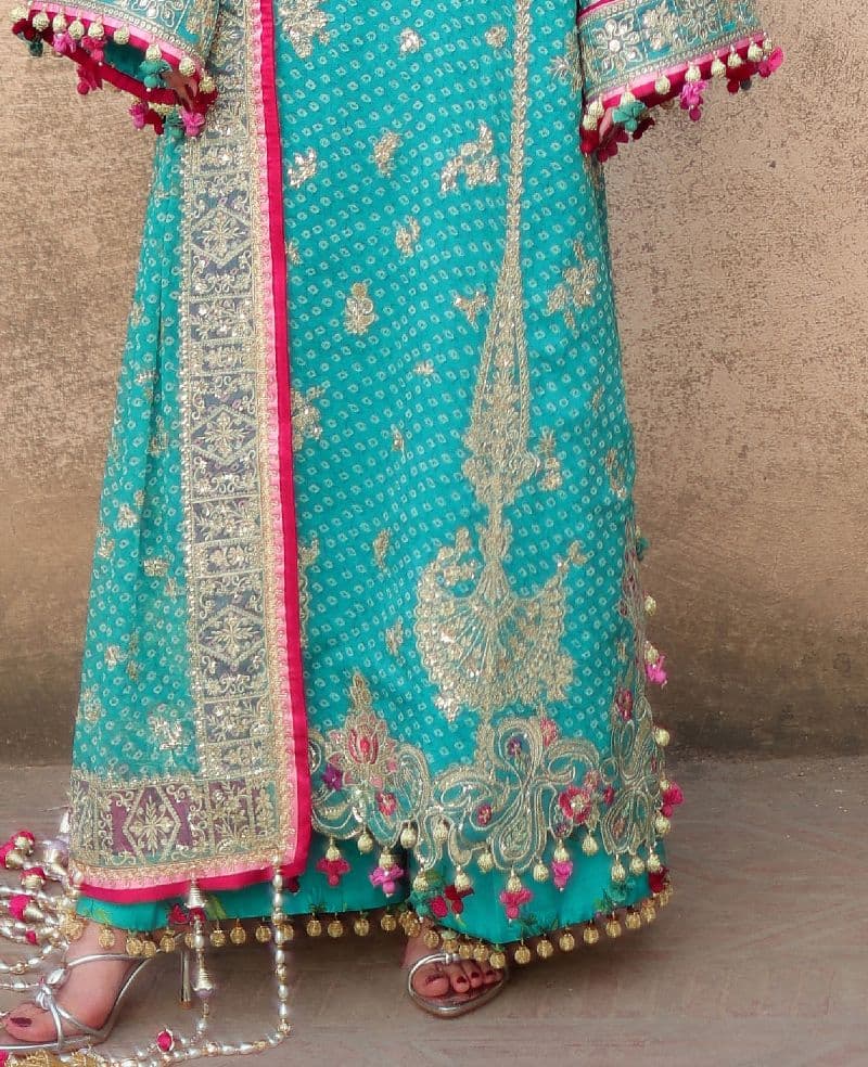 Embroidered Raw Silk 2 Piece Unstitched Suit