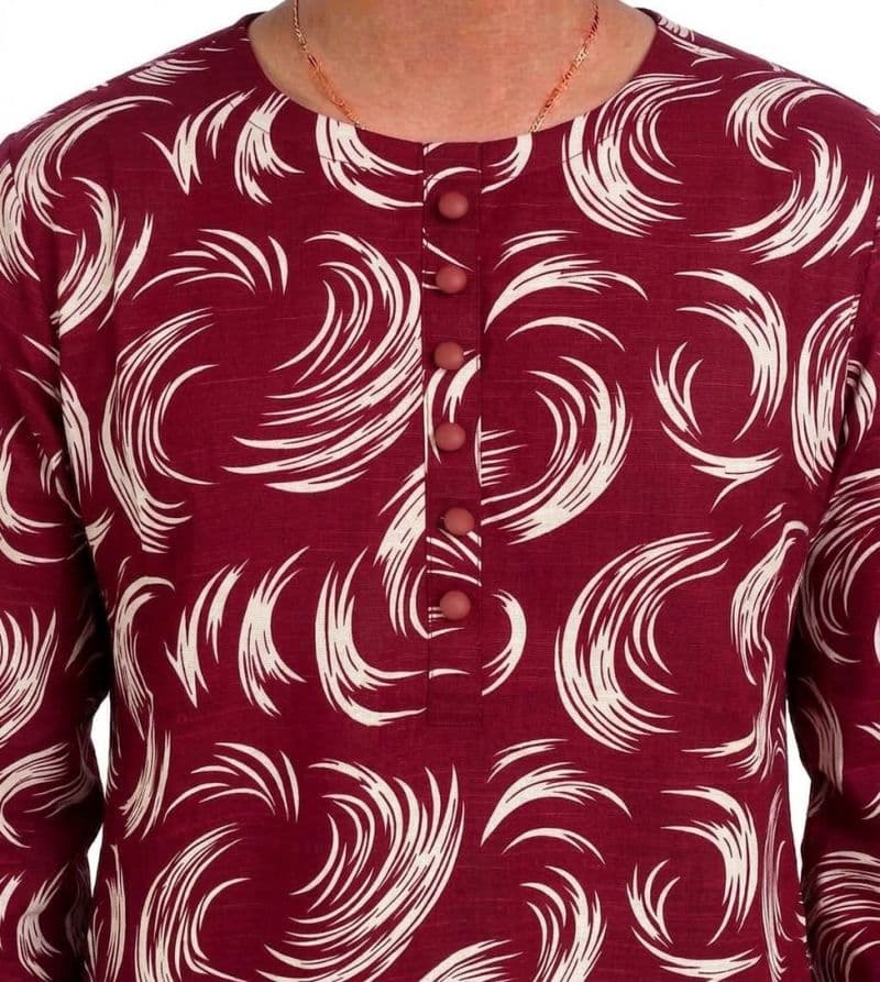 Plum Khaddar Maroon Colour Printed White Patterns with Maroon Buttons on 2pc stitched suit for Girls.