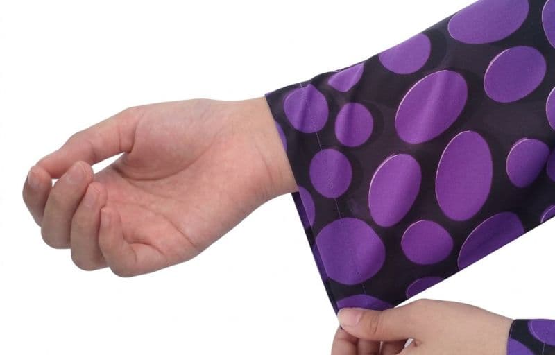 Plum Lilen (imported Fabric) Black colour printed Purple Patterns with Purple buttons on 2pc stitched suit for Girls. thumbnail