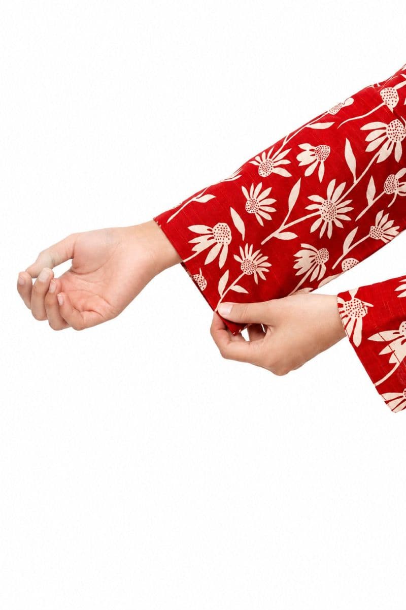 Plum Khaddar Rust colour printed Off White Flowers with Off White buttons on 2pc stitched suit for Girls. thumbnail