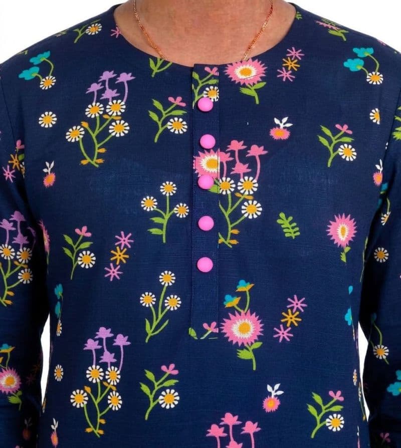 Plum Khaddar Dark Blue colour printed Pink Purple White Flowers with Pink buttons on 2pc stitched suit for Girls. thumbnail